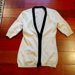Cashmere 3/4 sleeve cardigan with pockets no size tag but fits like a small